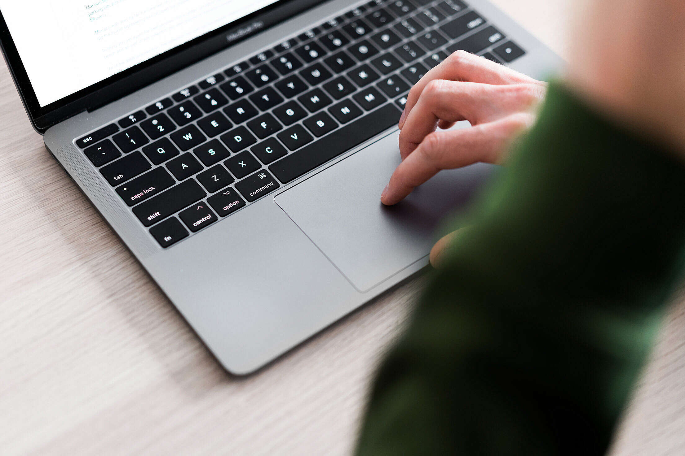 man-using-touchpad-on-his-laptop-free-stock-photo-picjumbo