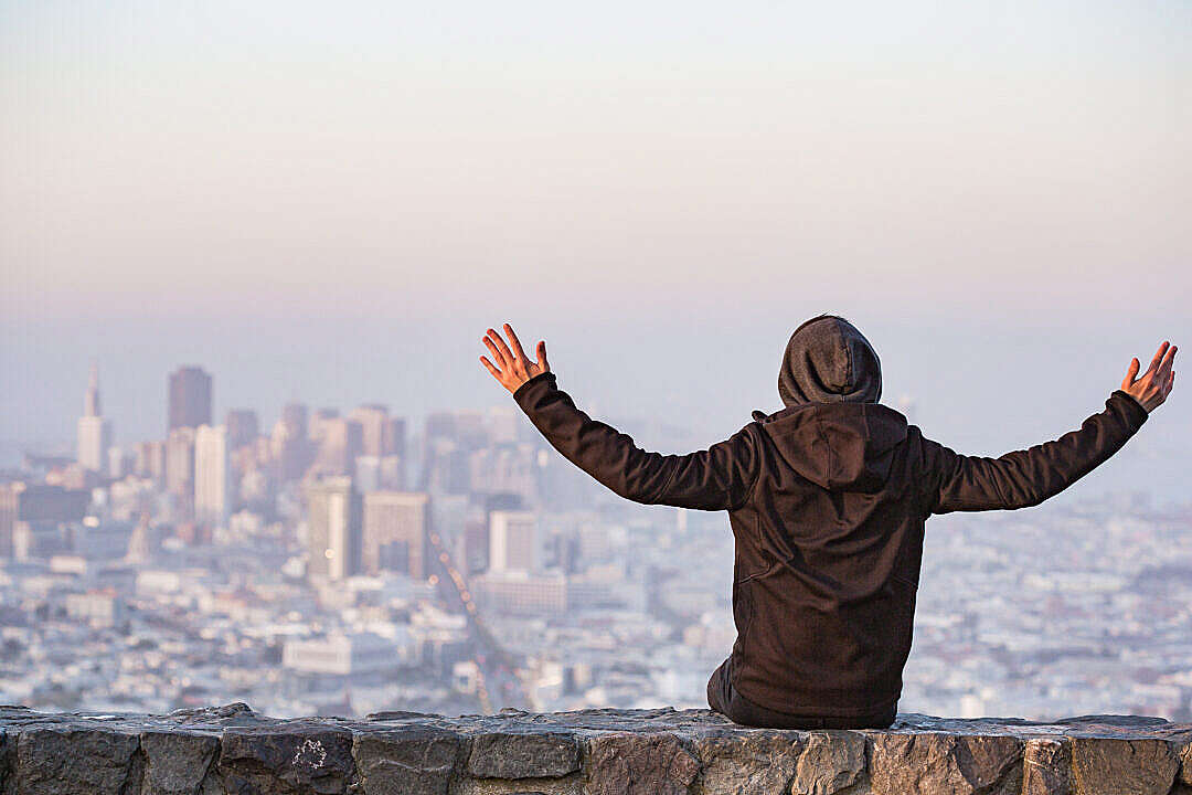 Man with Open Arms Saluting the San Francisco City