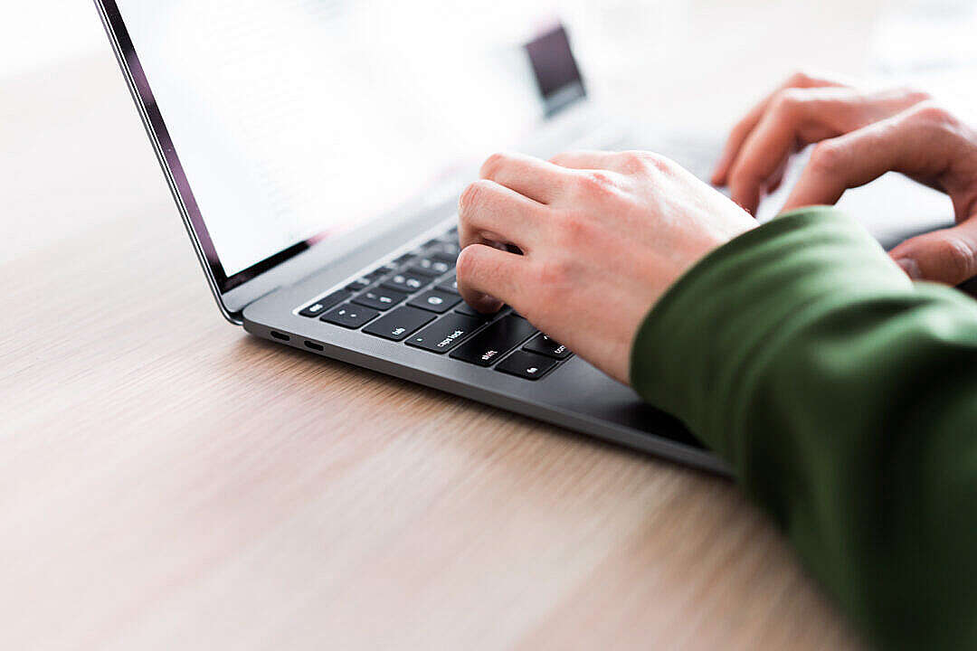 Man Working on His Laptop Computer