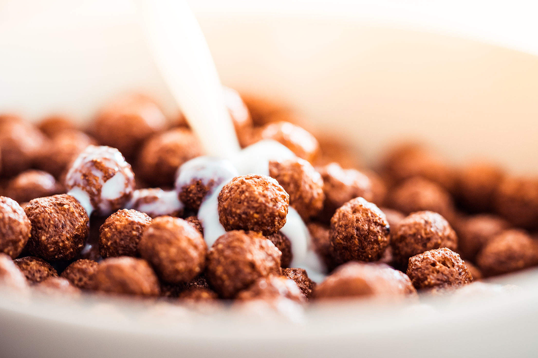 Milk Pouring on Cereal Chocolate Balls #2 Free Stock Photo