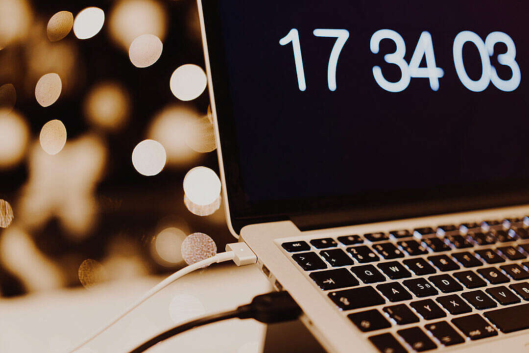 Modern Laptop and Christmas Bokeh