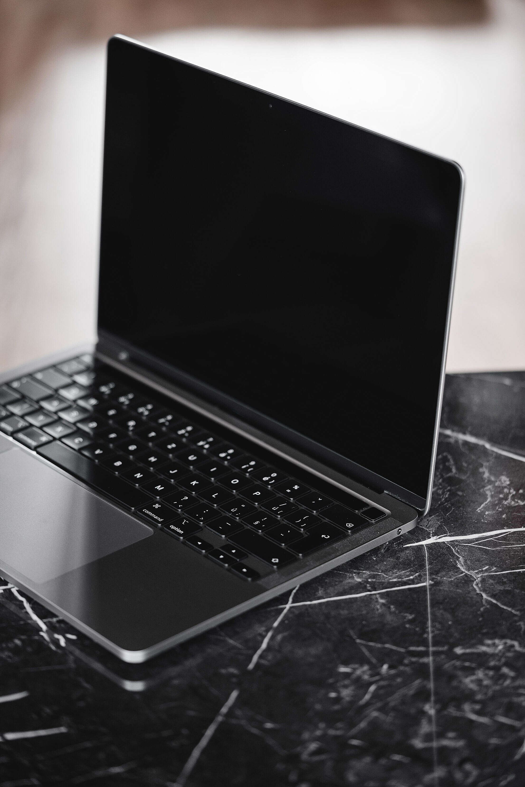 Modern Laptop on a Luxury Marble Table Free Stock Photo