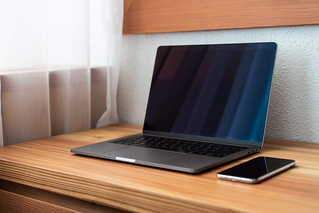 Modern Laptop on Wooden Desk