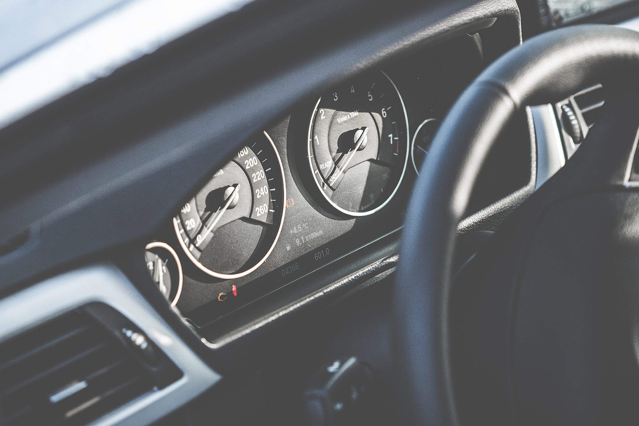 New Modern Car Dashboard with Speedometer and Tachometer Free Stock Photo