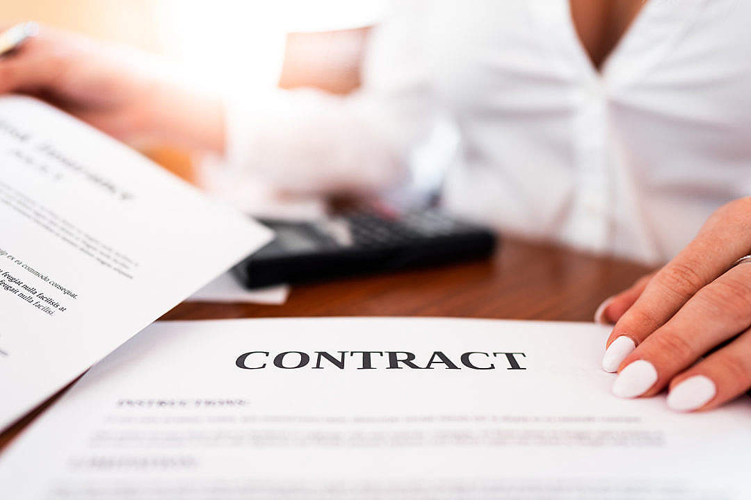 Office Worker Showing a Contract