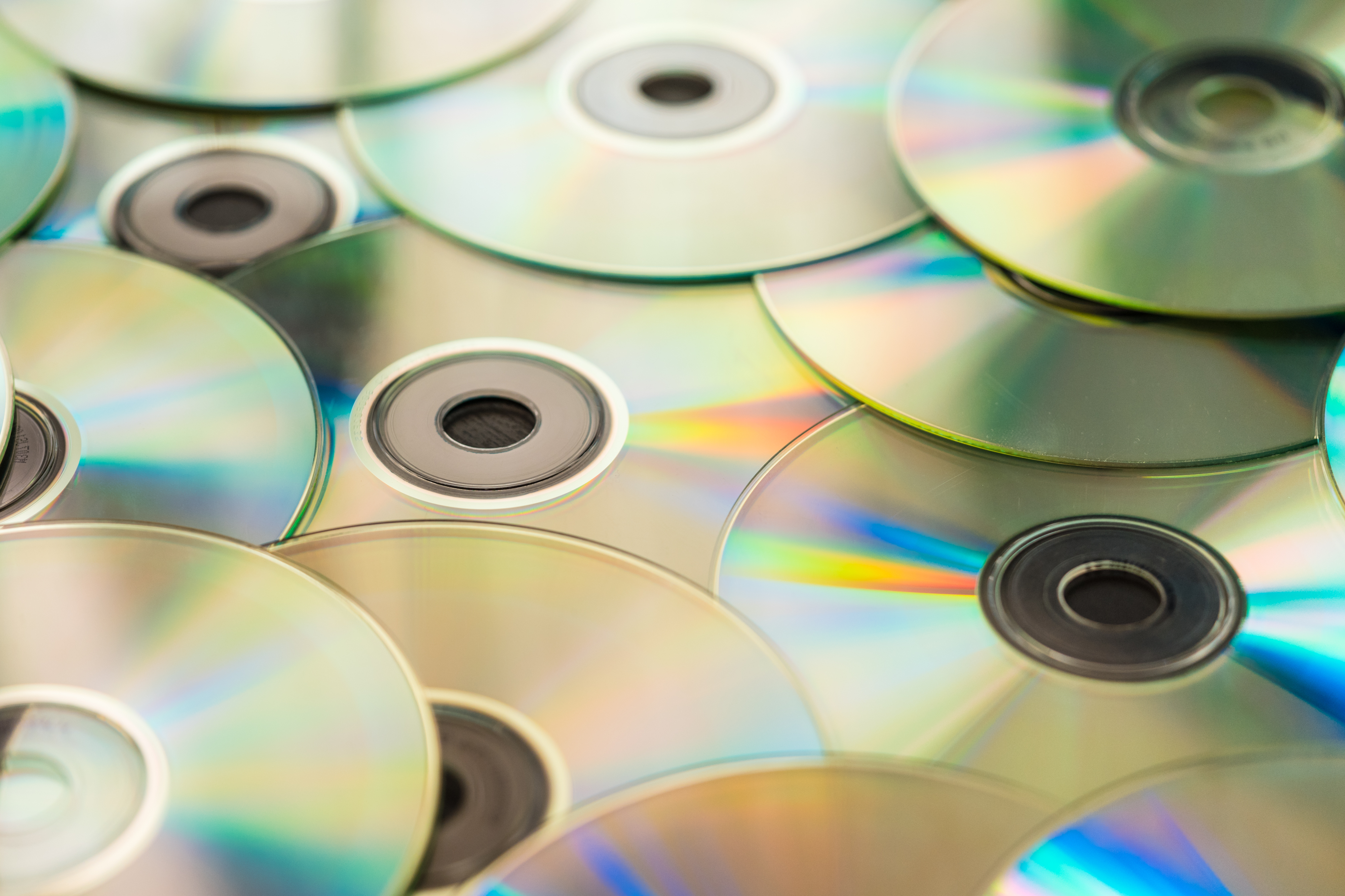 Pile of CD Compact Discs and DVDs #2 Free Stock Photo | picjumbo