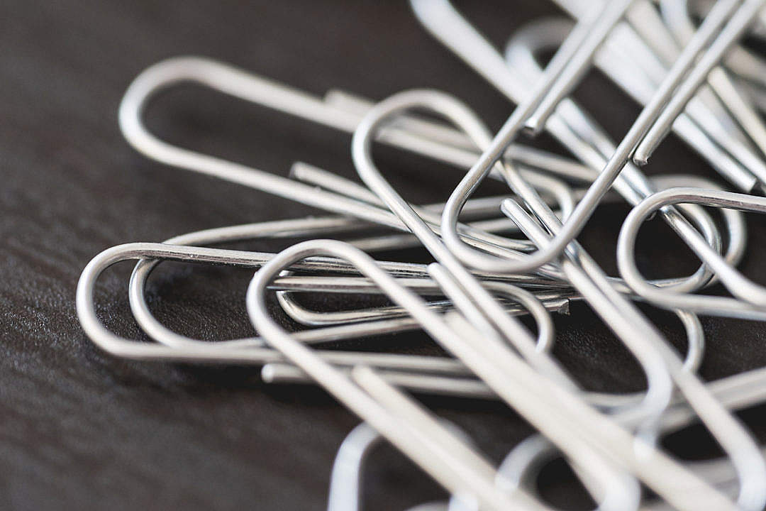 Download Pile of Silver Paper Clips Close Up FREE Stock Photo