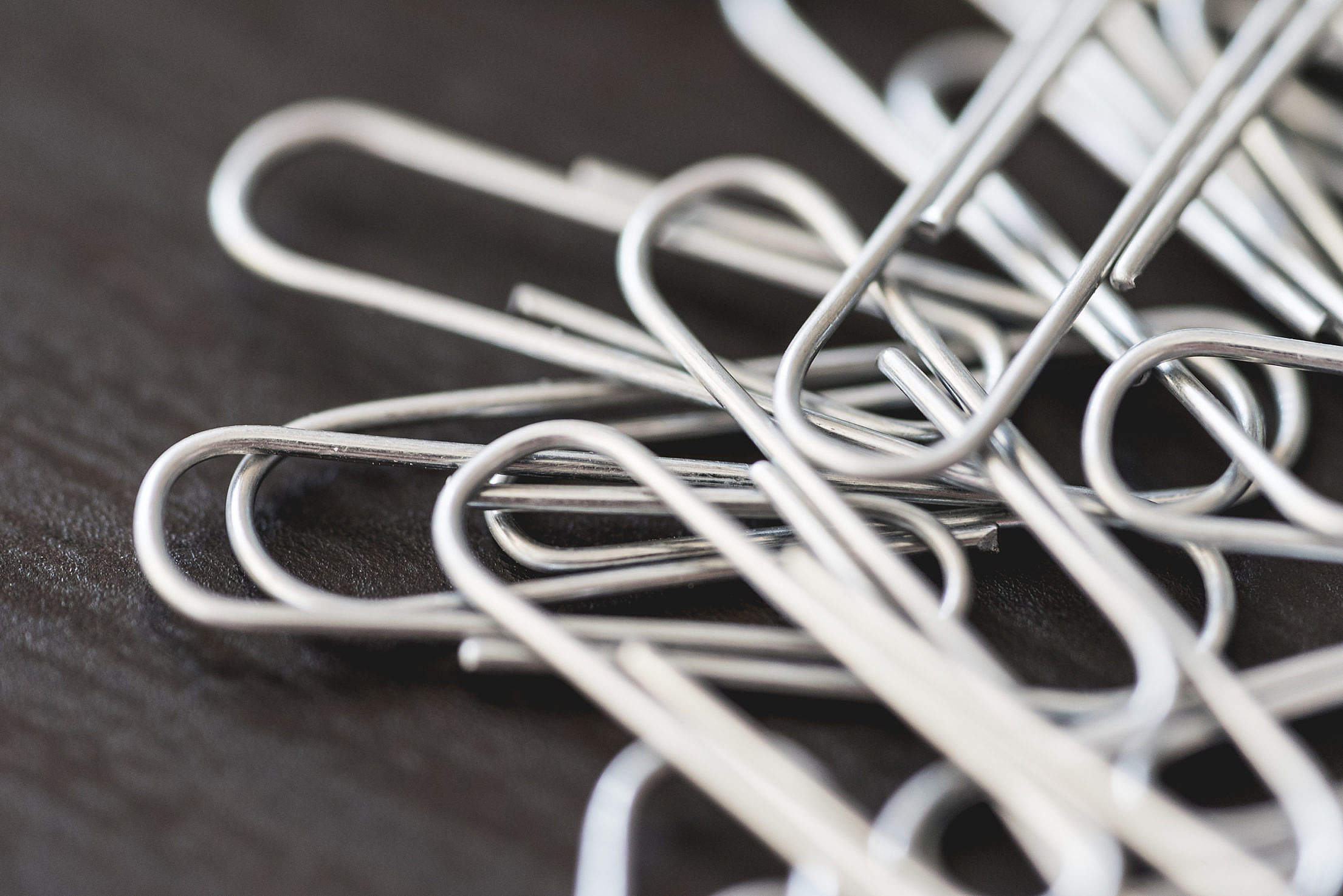 Pile of Silver Paper Clips Close Up Free Stock Photo.