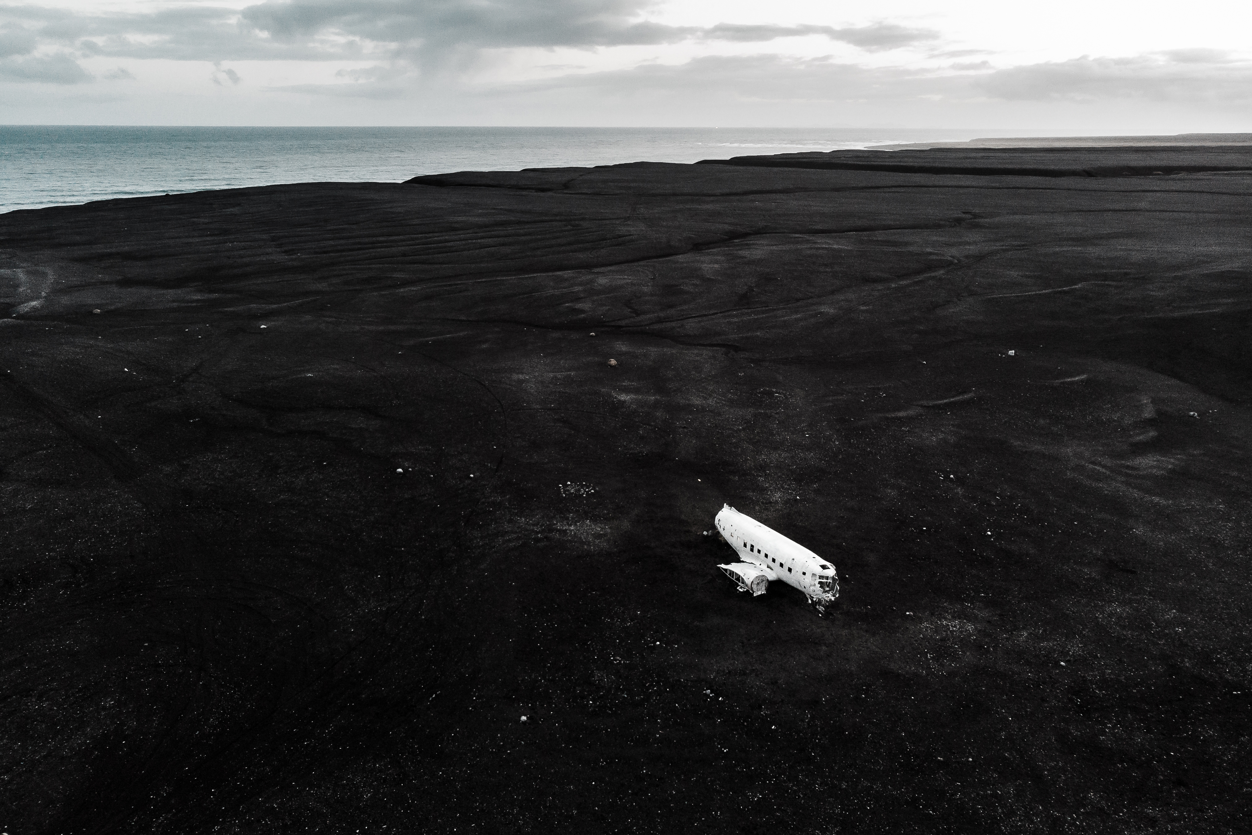 Plane on The Black Sand in Iceland Free Stock Photo | picjumbo