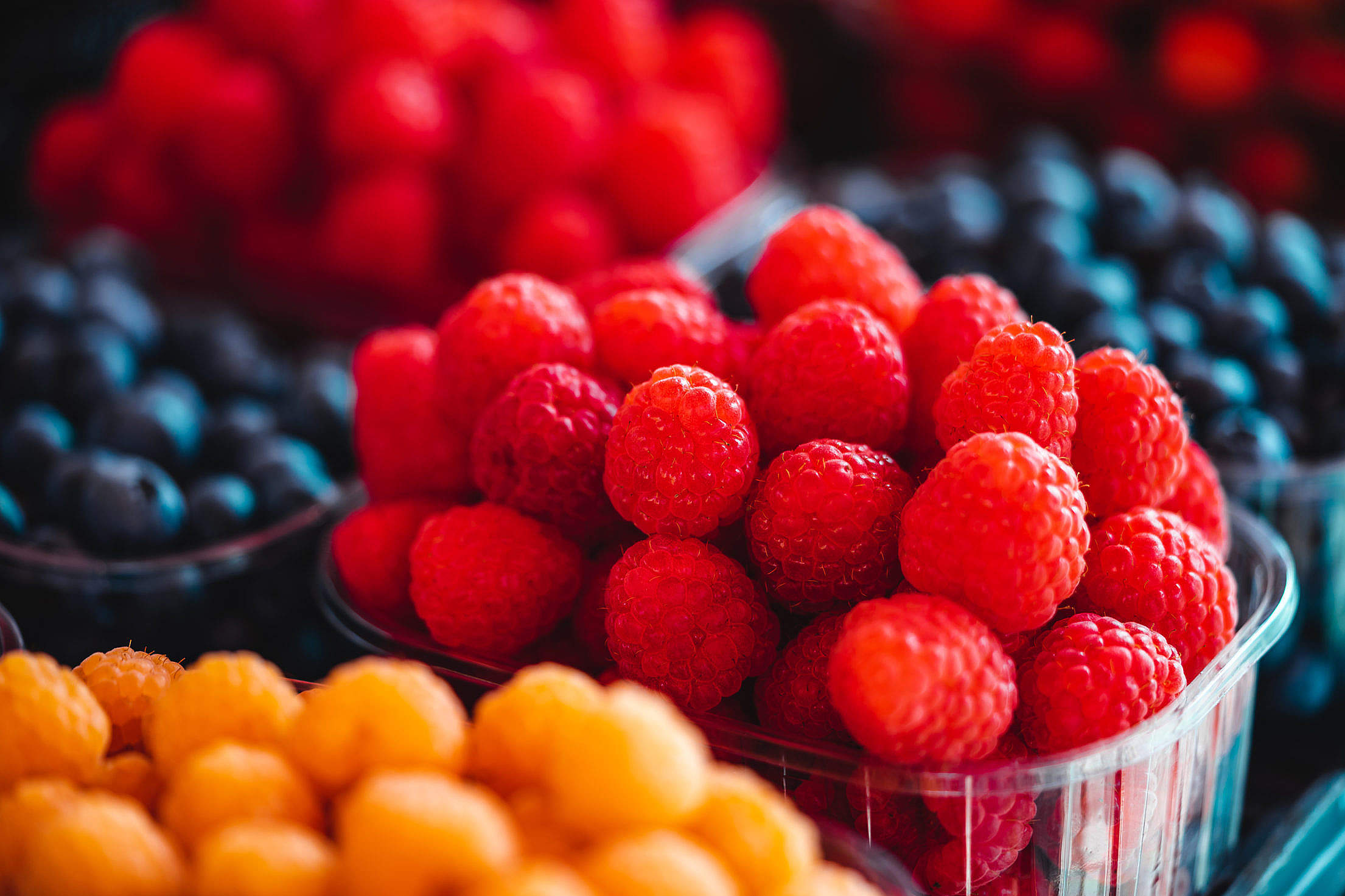 Raspberries and Blueberries on The Farmers Market Free Stock Photo