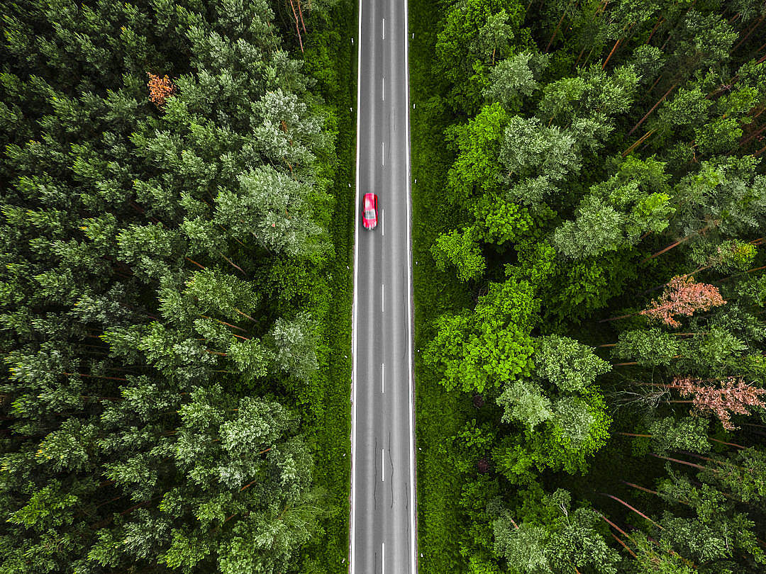 Red Car on the Road Aerial Photo