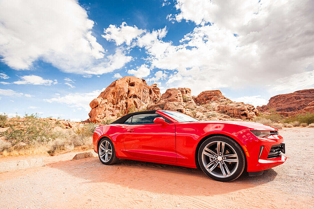 Red Convertible in a National Park