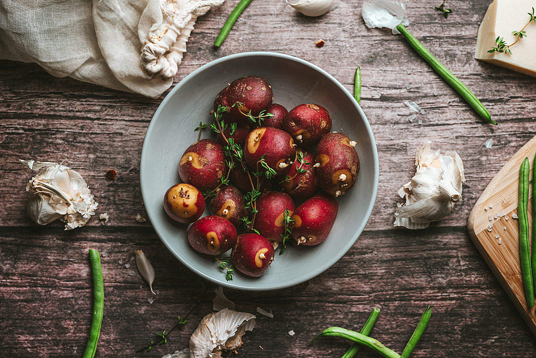 Red Potatoes with Thyme on a Rustic Table