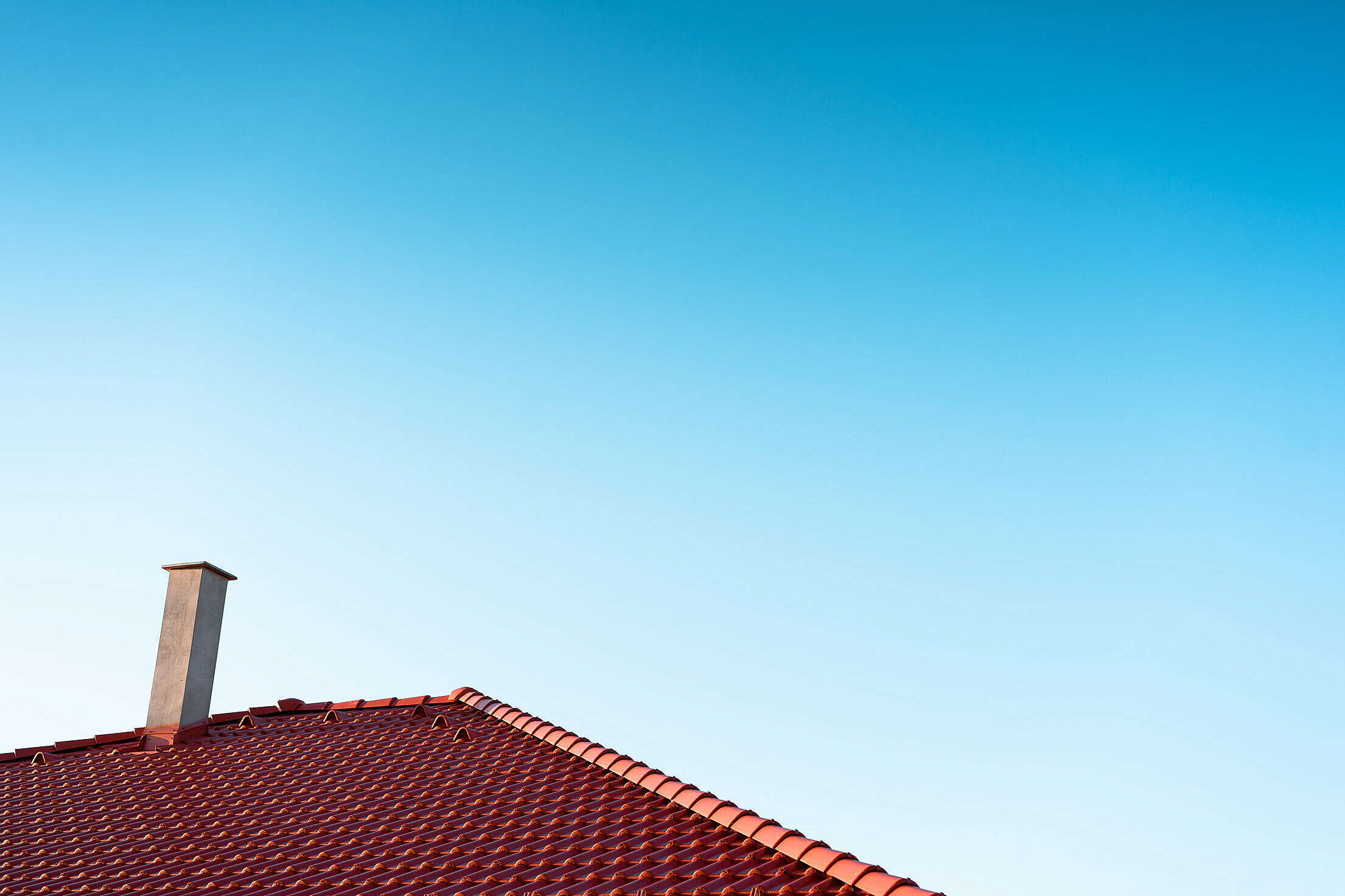 Red Roof with Clay Tiles and Chimney Free Stock Photo