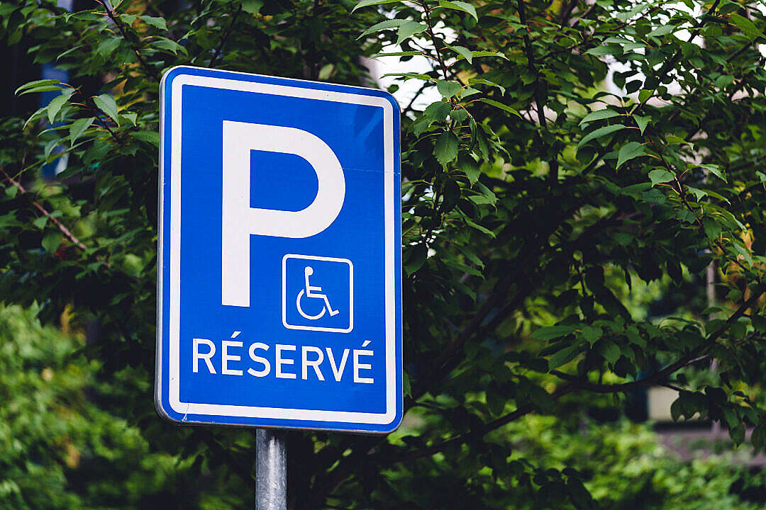 Download Réservé Parking Traffic Sign Reserved for Handicapped FREE Stock Photo