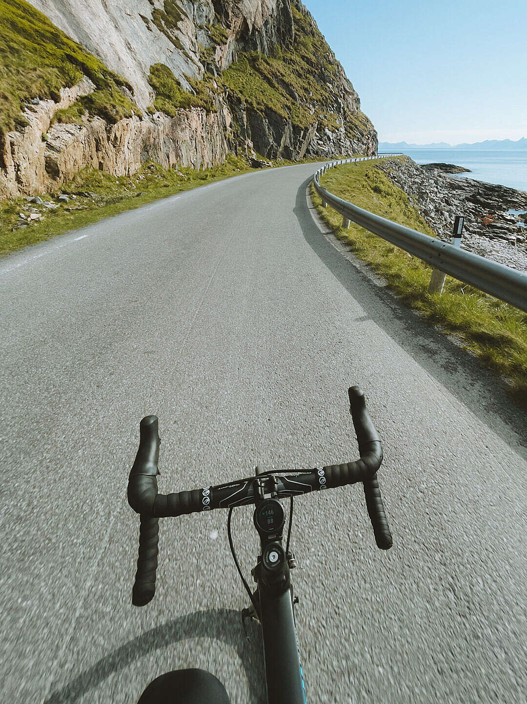 Download Road Cycling on Coastal Road FREE Stock Photo
