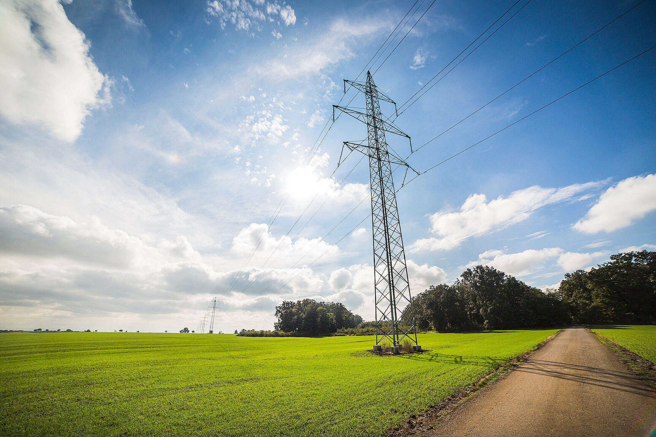 Road Under Power Line Electricity Pylons Free Stock Photo picjumbo