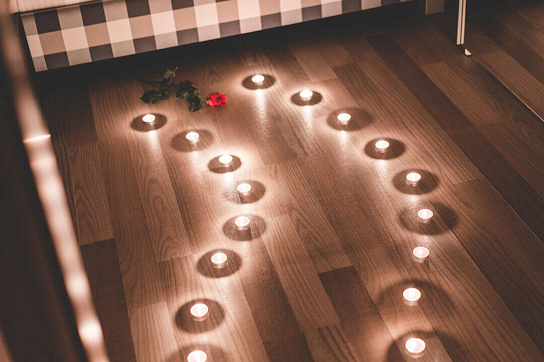 Download Romantic Candles as a Pathway in a Bedroom FREE Stock Photo