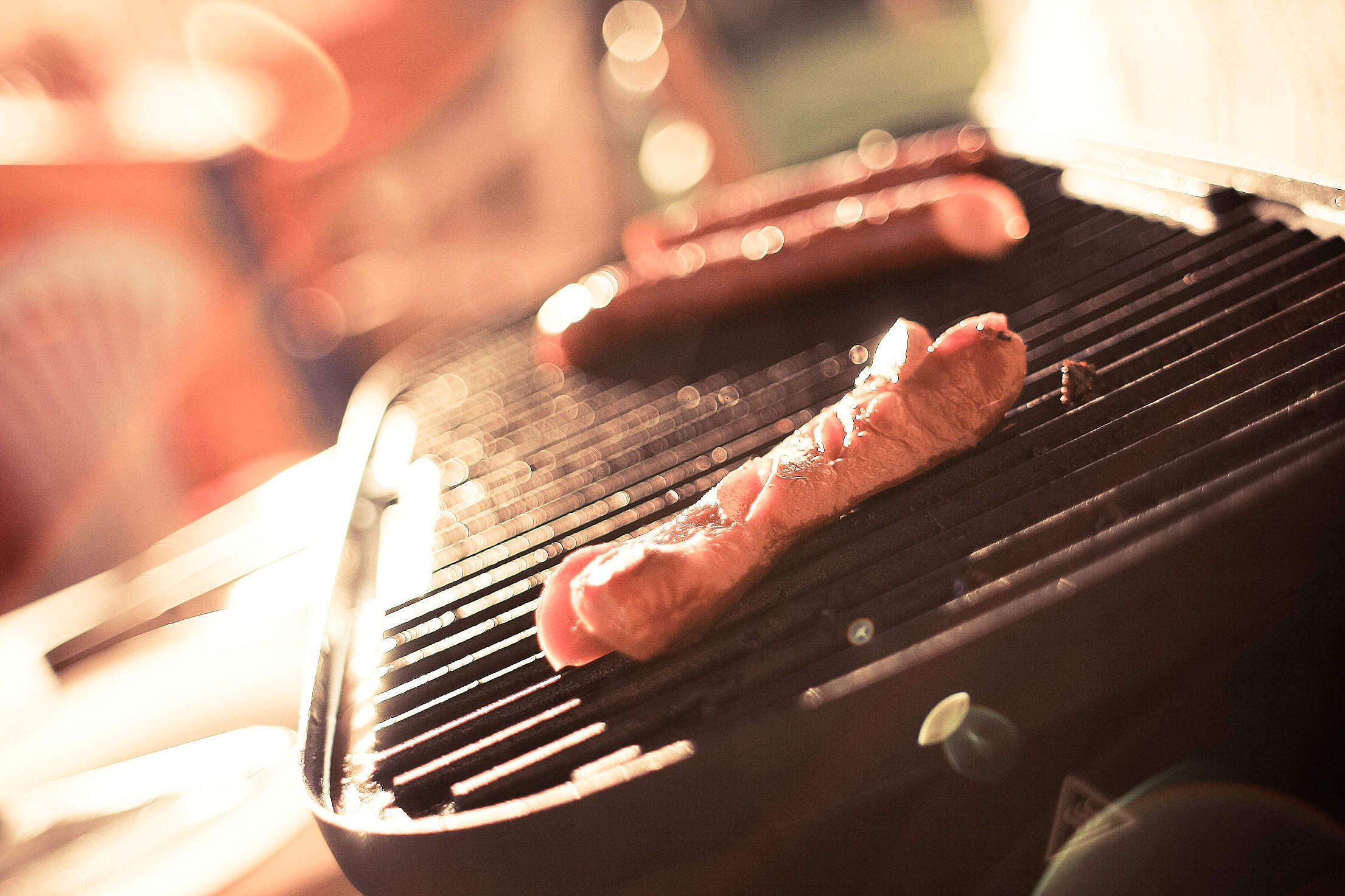 Sausages on a Grill Free Stock Photo