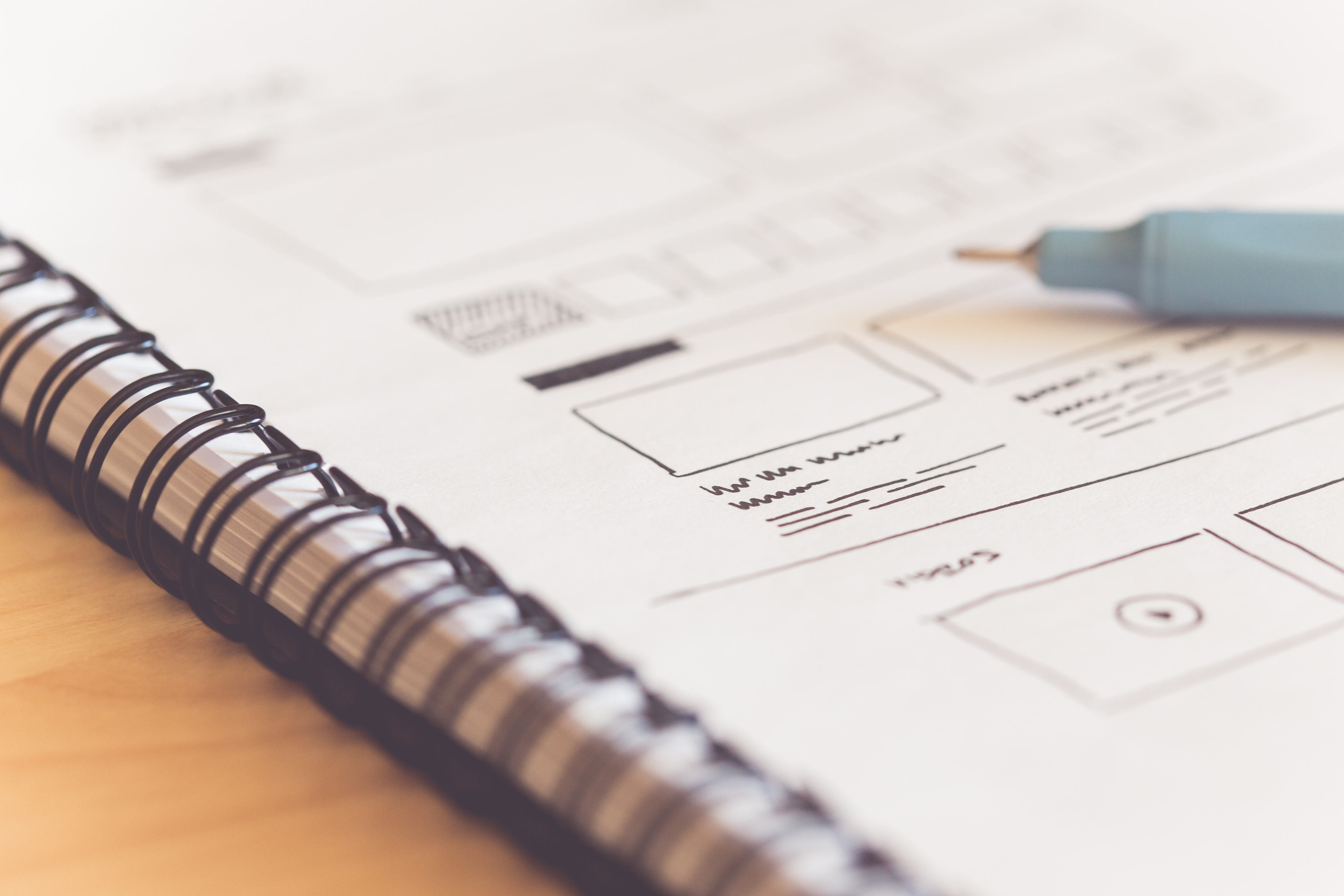 UX website designer drawing wireframe sketch of prototype, framework, layout  future project. Creative user experience concept website template. Designer  workspace Stock Photo | Adobe Stock