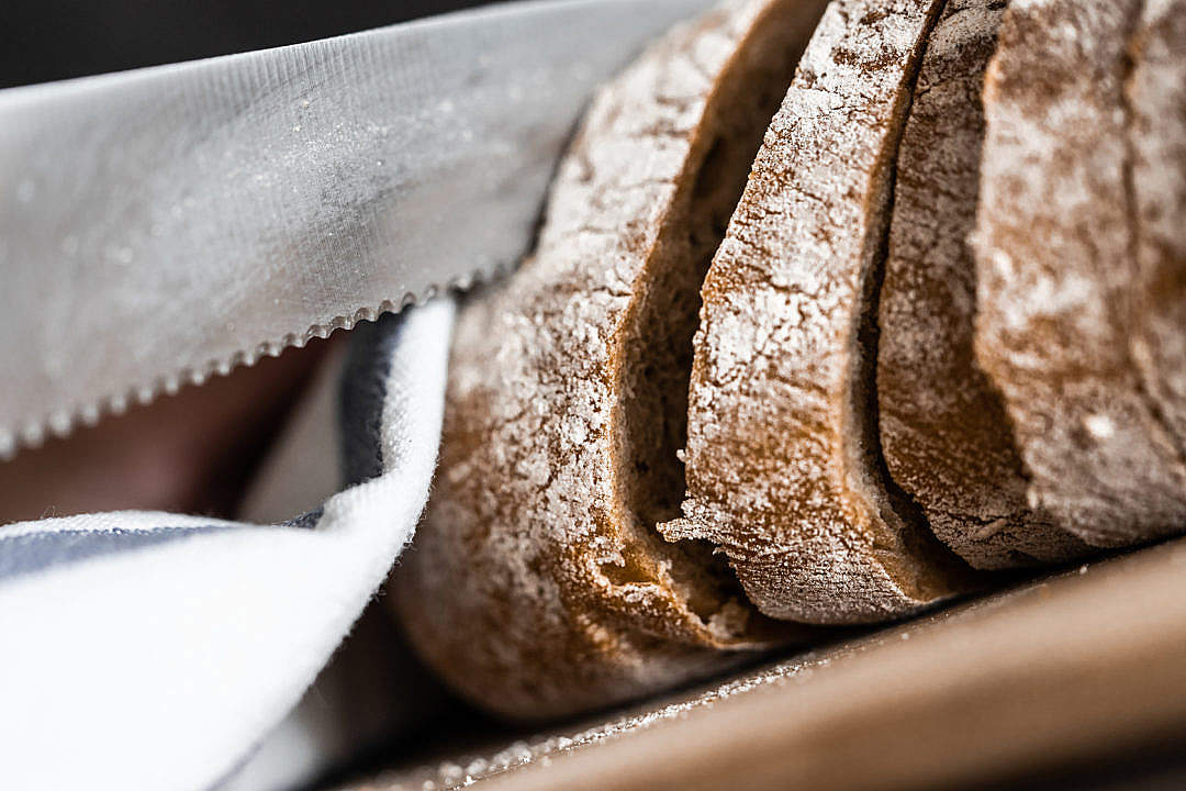 Download Slicing Bread Knife Close Up FREE Stock Photo
