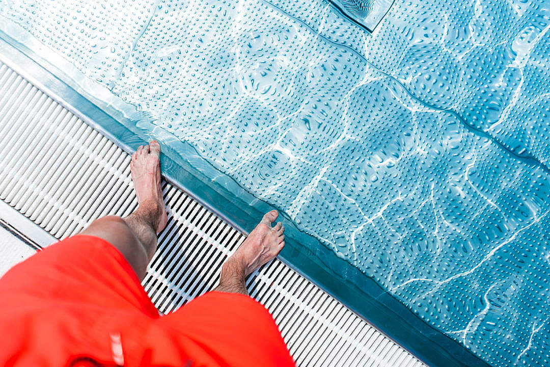 Standing at The Edge of Swimming Pool