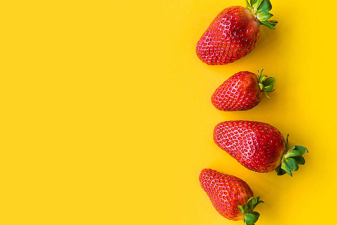 Strawberries with Yellow Background