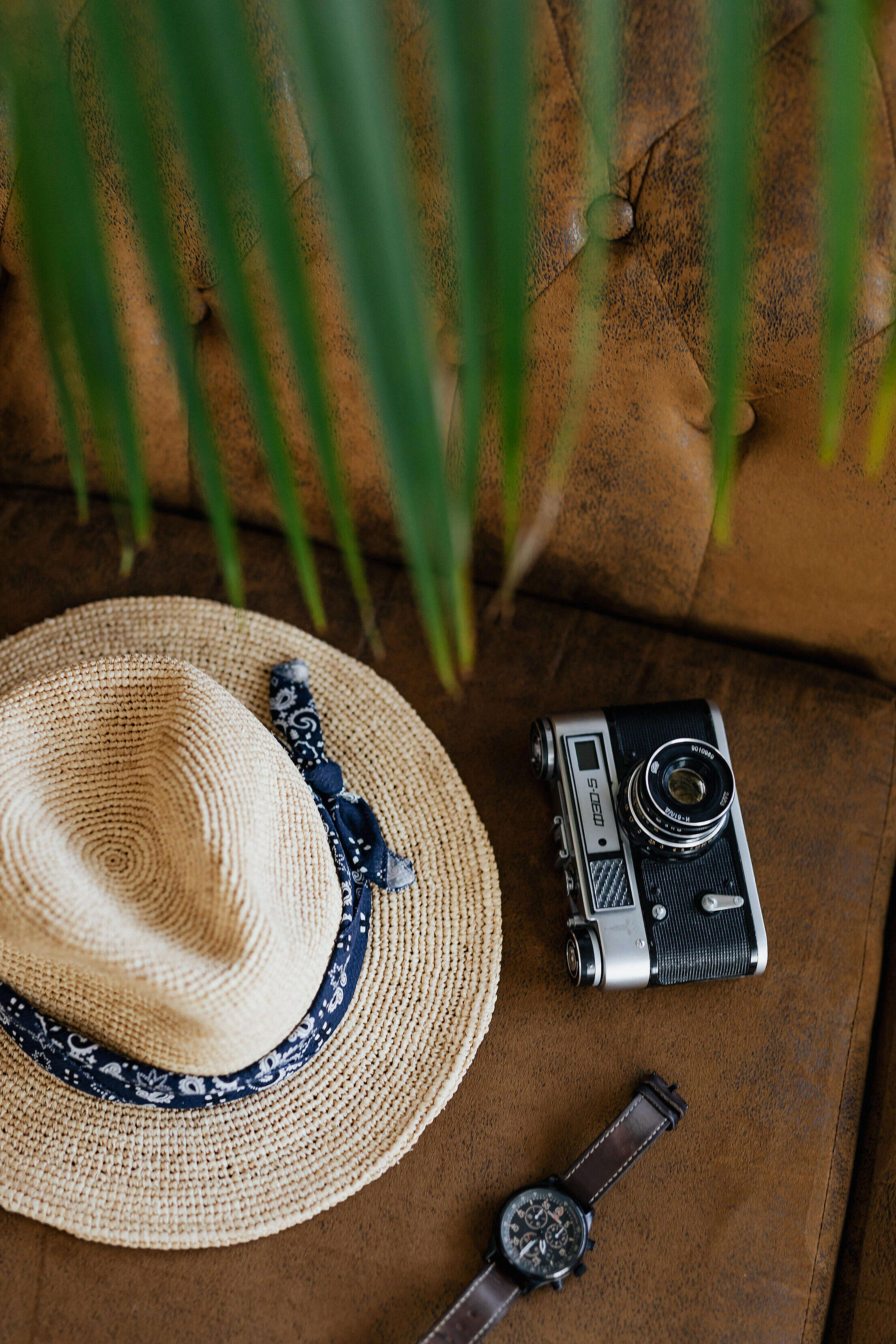 Summer Travel Mood Photo Straw Hat with Analog Camera and Watch Free Stock Photo