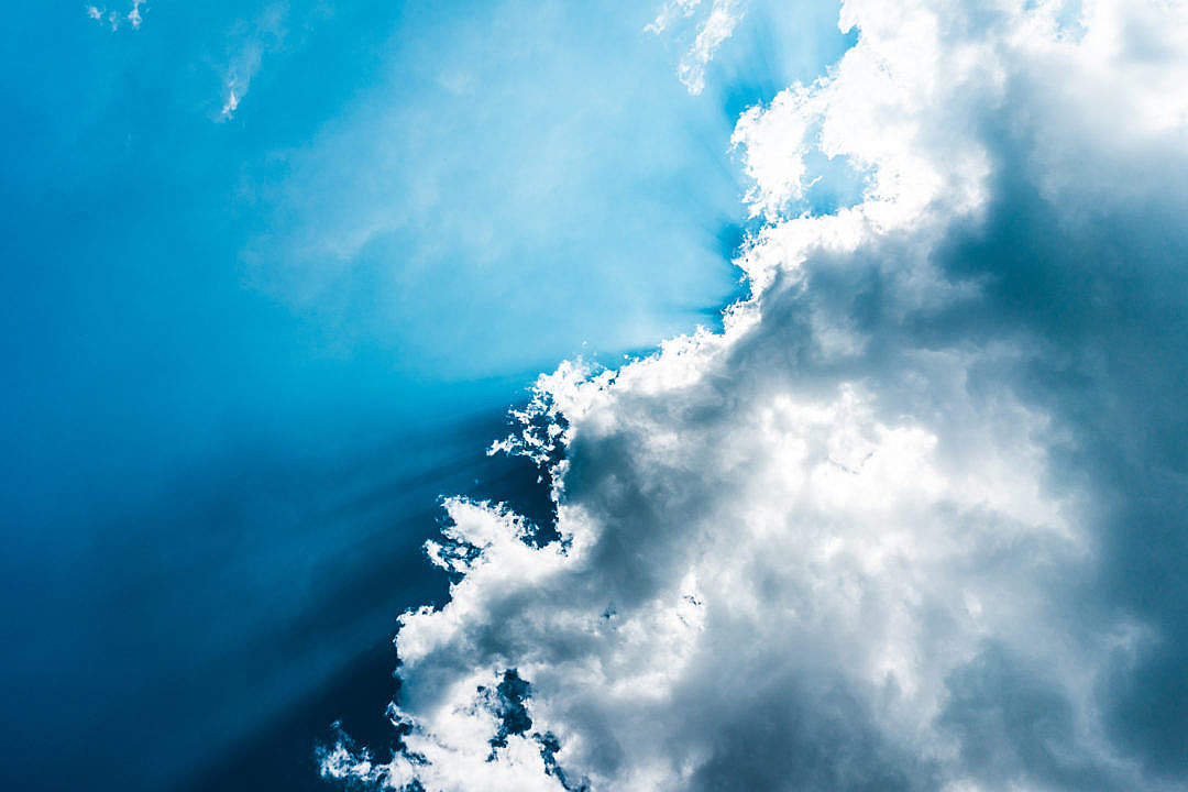 Download Sun Behind Clouds FREE Stock Photo