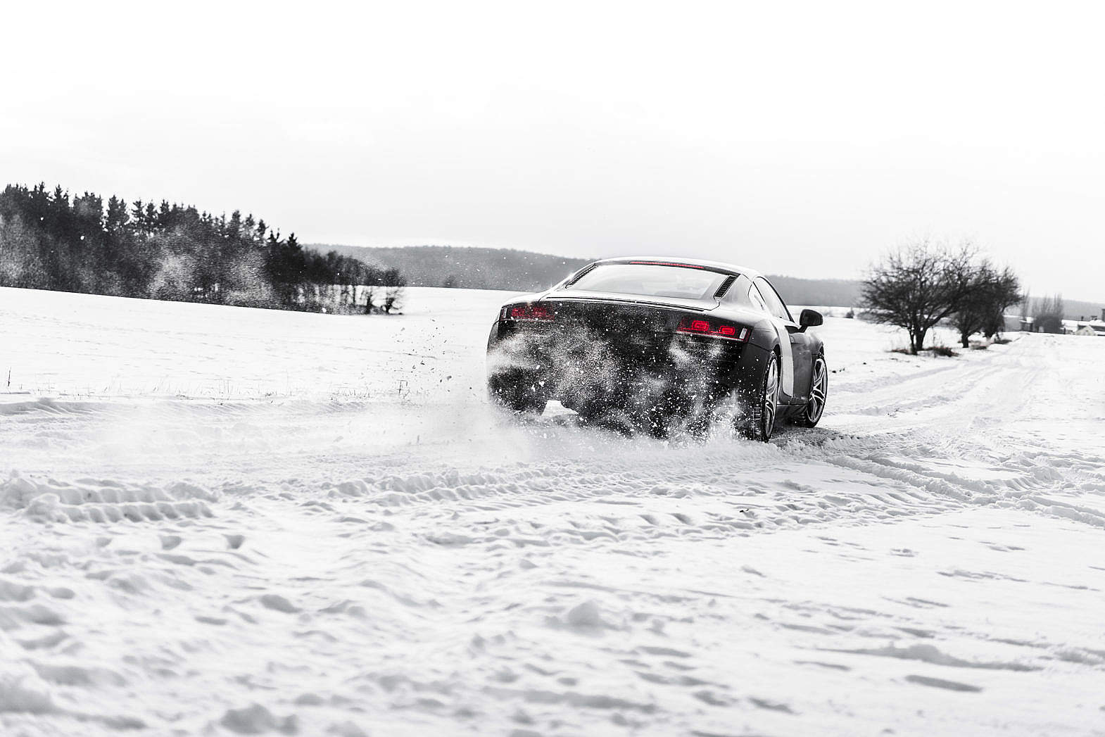 Supercar Drifting on a Snow Covered Road Free Stock Photo | picjumbo