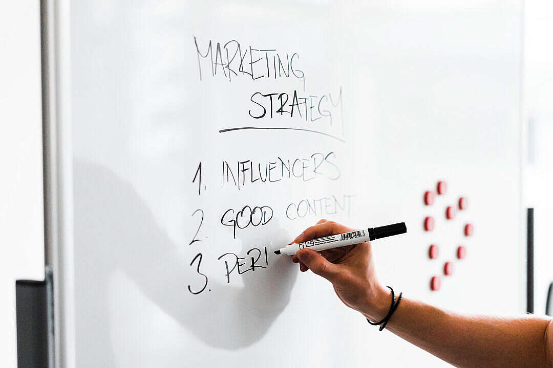 Team Leader Writing on White Board