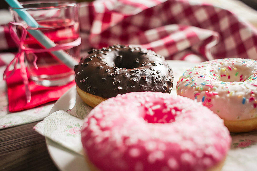 Download Three Yummy Sweet Colorful Donuts FREE Stock Photo