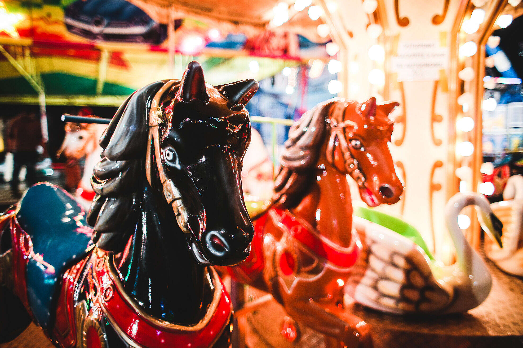 Traditional Carousel Horses on a Fun Fair Ride Free Stock Photo