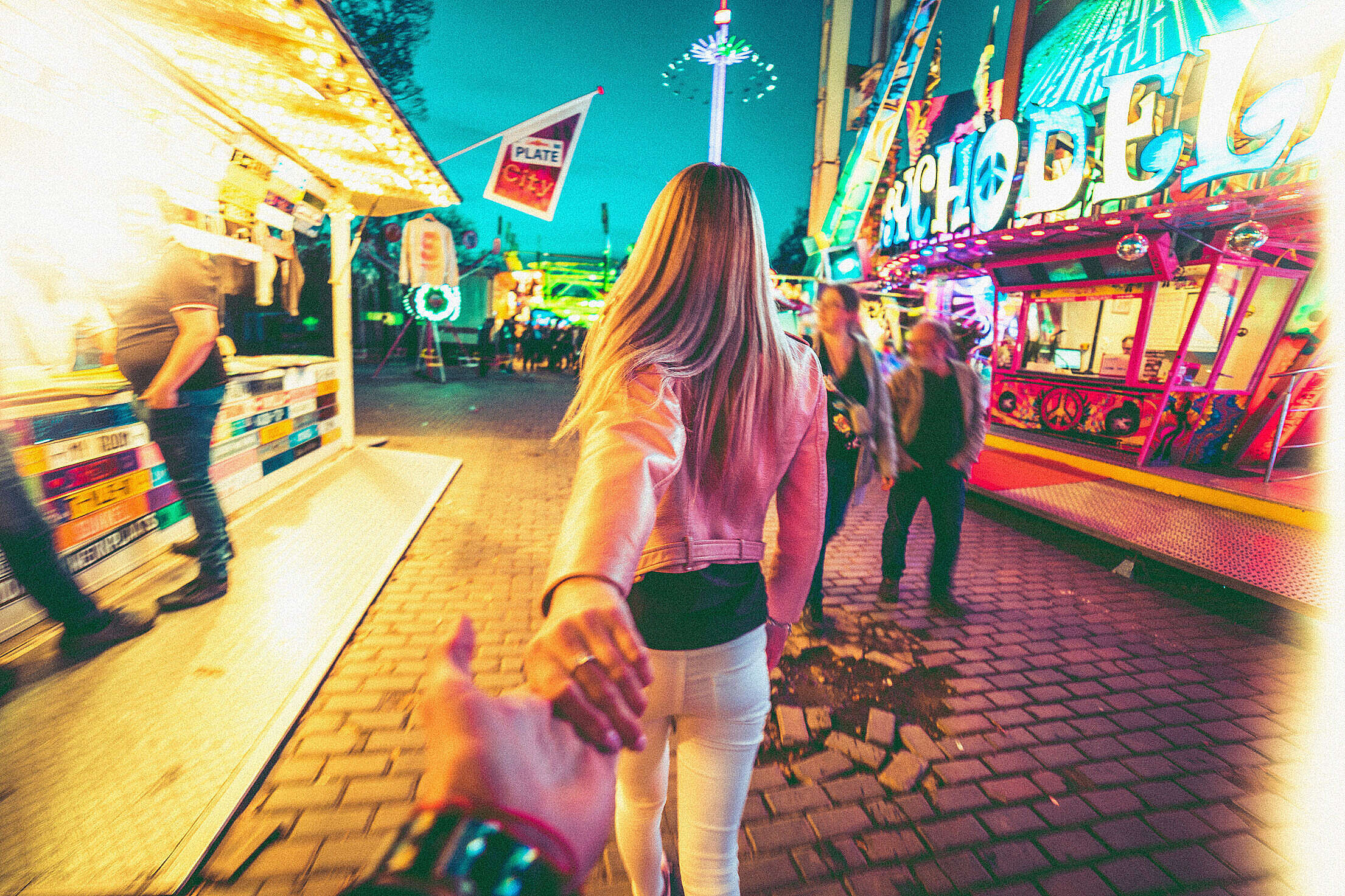 Walking Through Amusement Park with a Girl Free Stock Photo