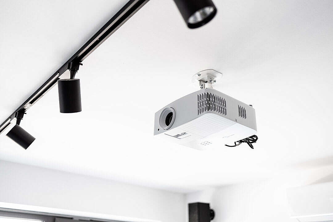 Download White 4K Projector Attached to Ceiling FREE Stock Photo
