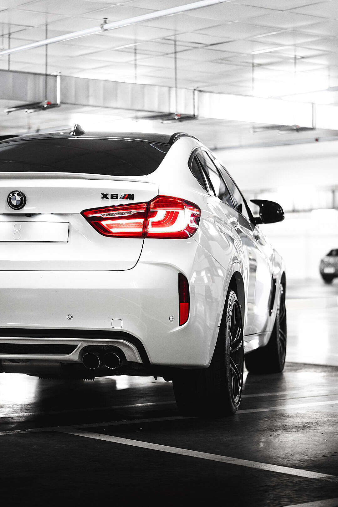 White BMW X6M Rear View