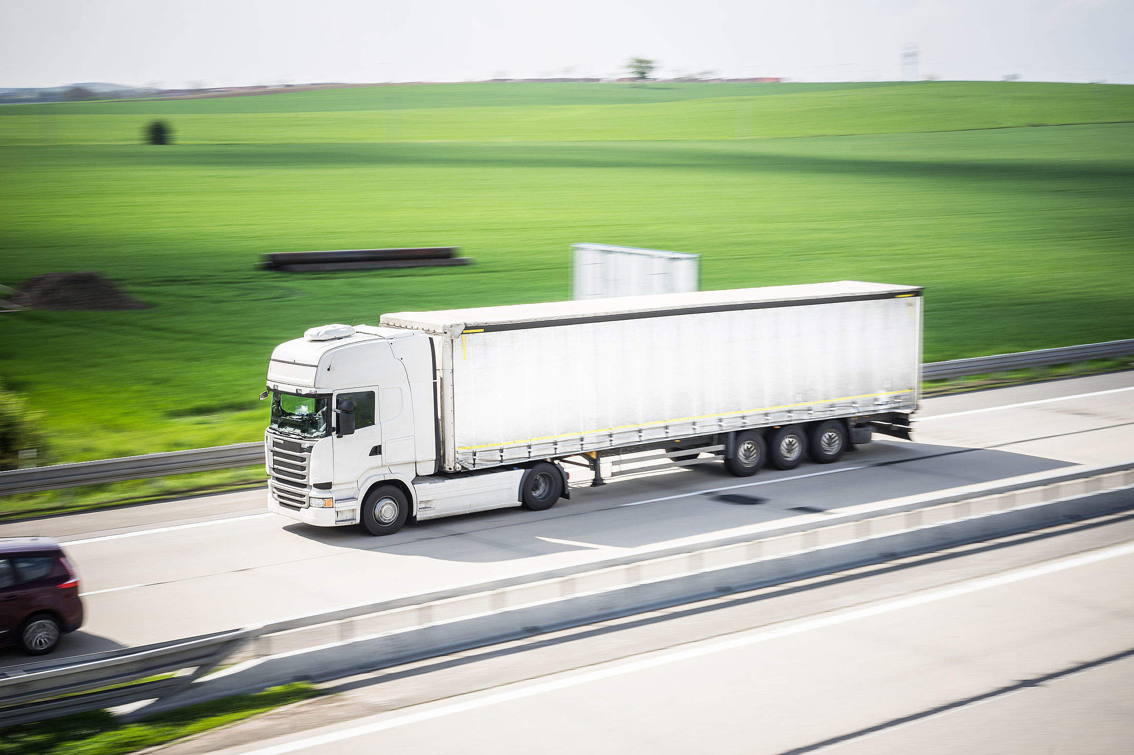 White TIR Truck in Motion Driving on Highway Free Stock Photo | picjumbo