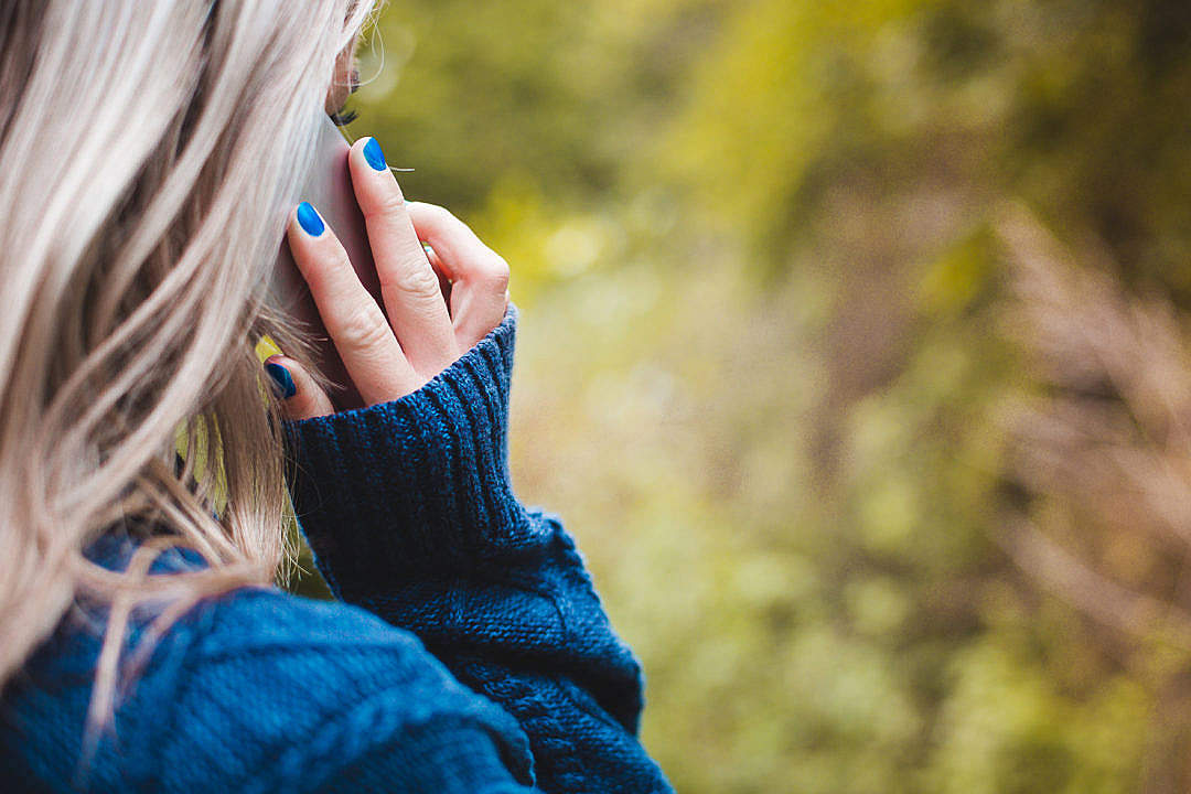 Download Woman Calling with Her Phone FREE Stock Photo