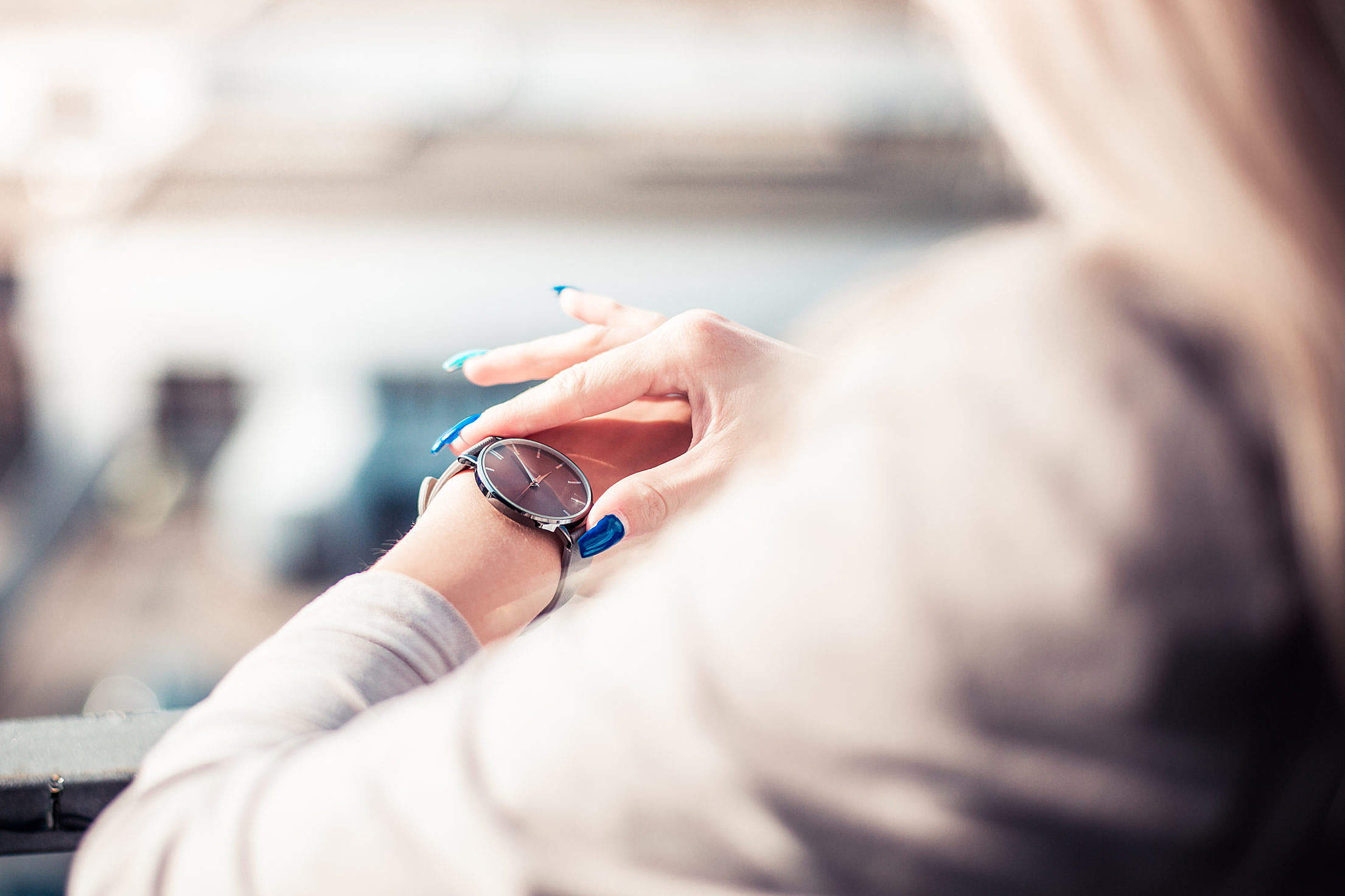 Woman Checking The Time on Her Fashion Watches Free Stock Photo