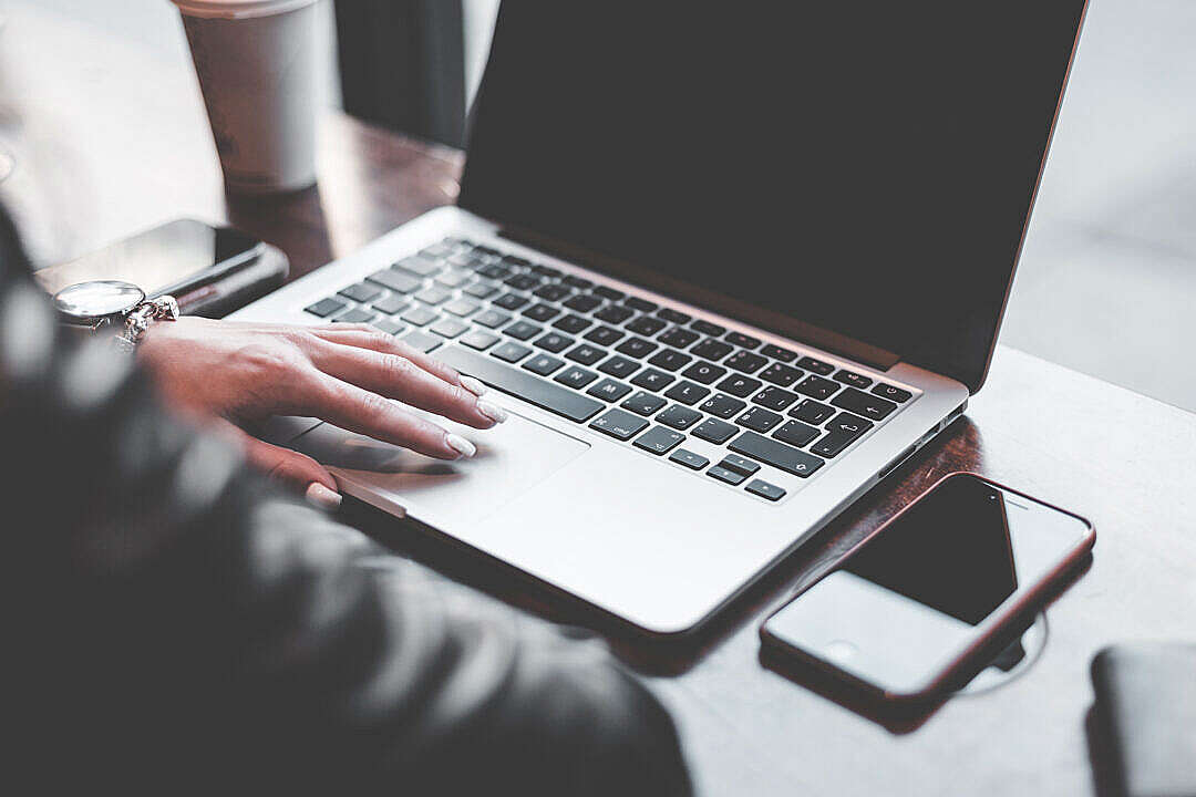 Woman Entrepreneur Working in Café