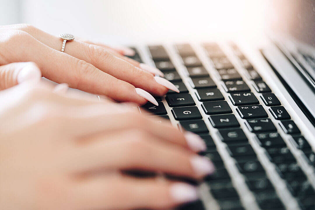 Woman Entrepreneur Working on Laptop Close Up