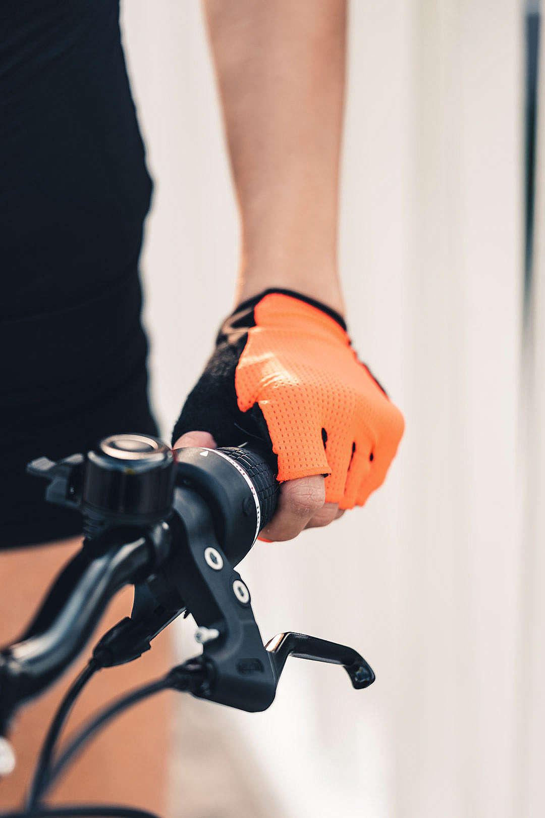 Download Woman Holding a Bicycle Handlebar FREE Stock Photo