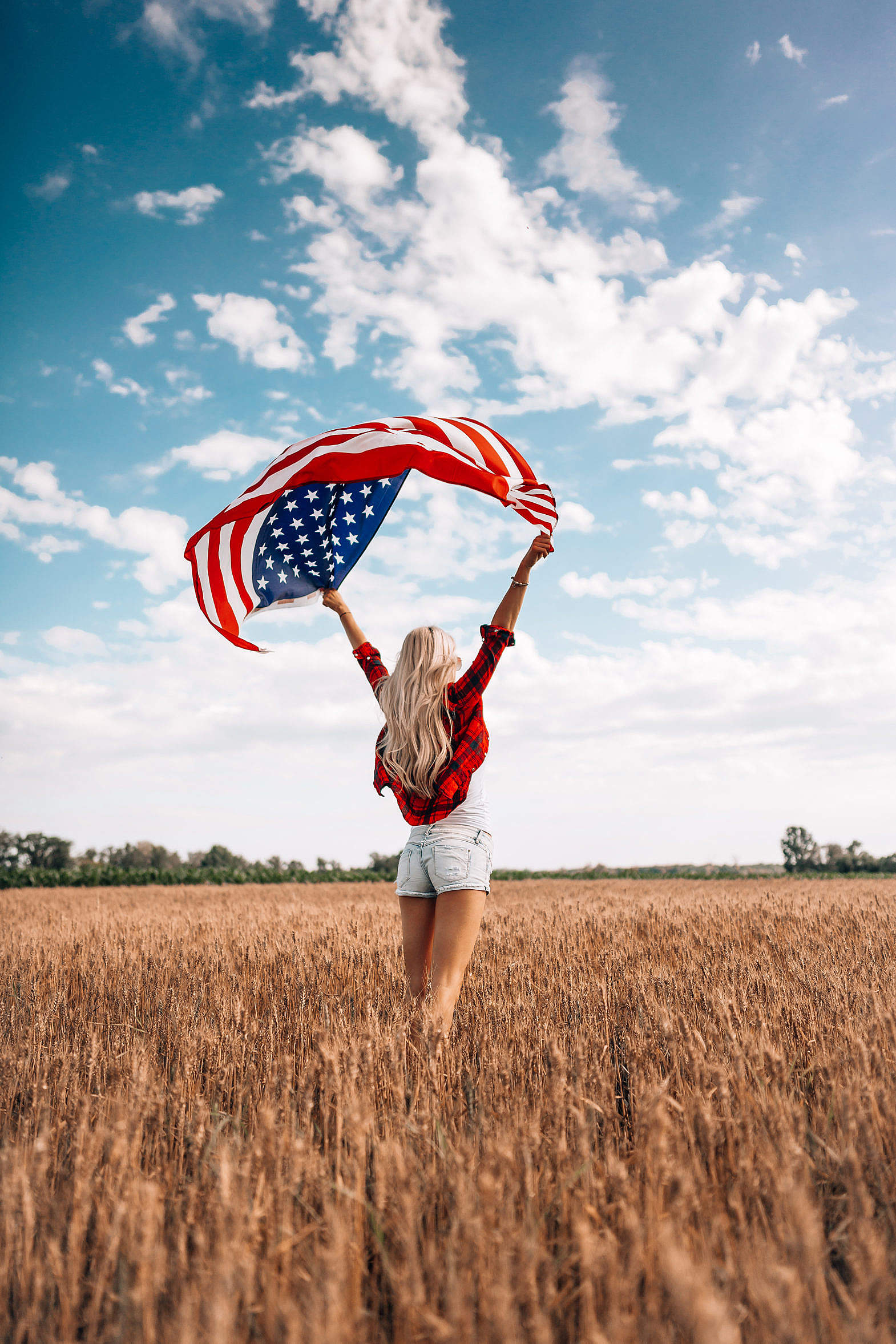 Woman Holding An American Flag In A Field Free Photo 1570x2355 