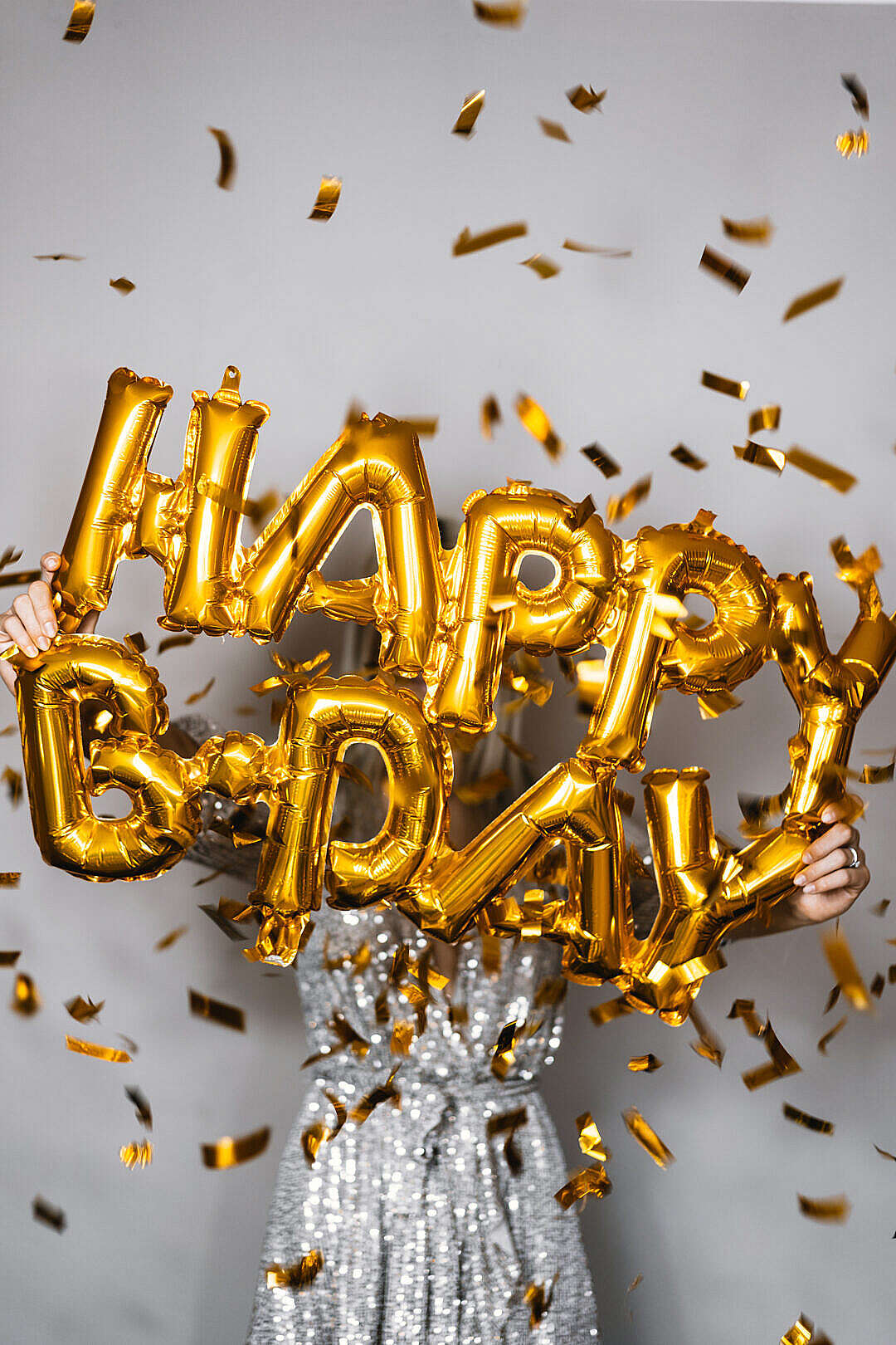 Download Woman Holding Happy Birthday Balloons FREE Stock Photo