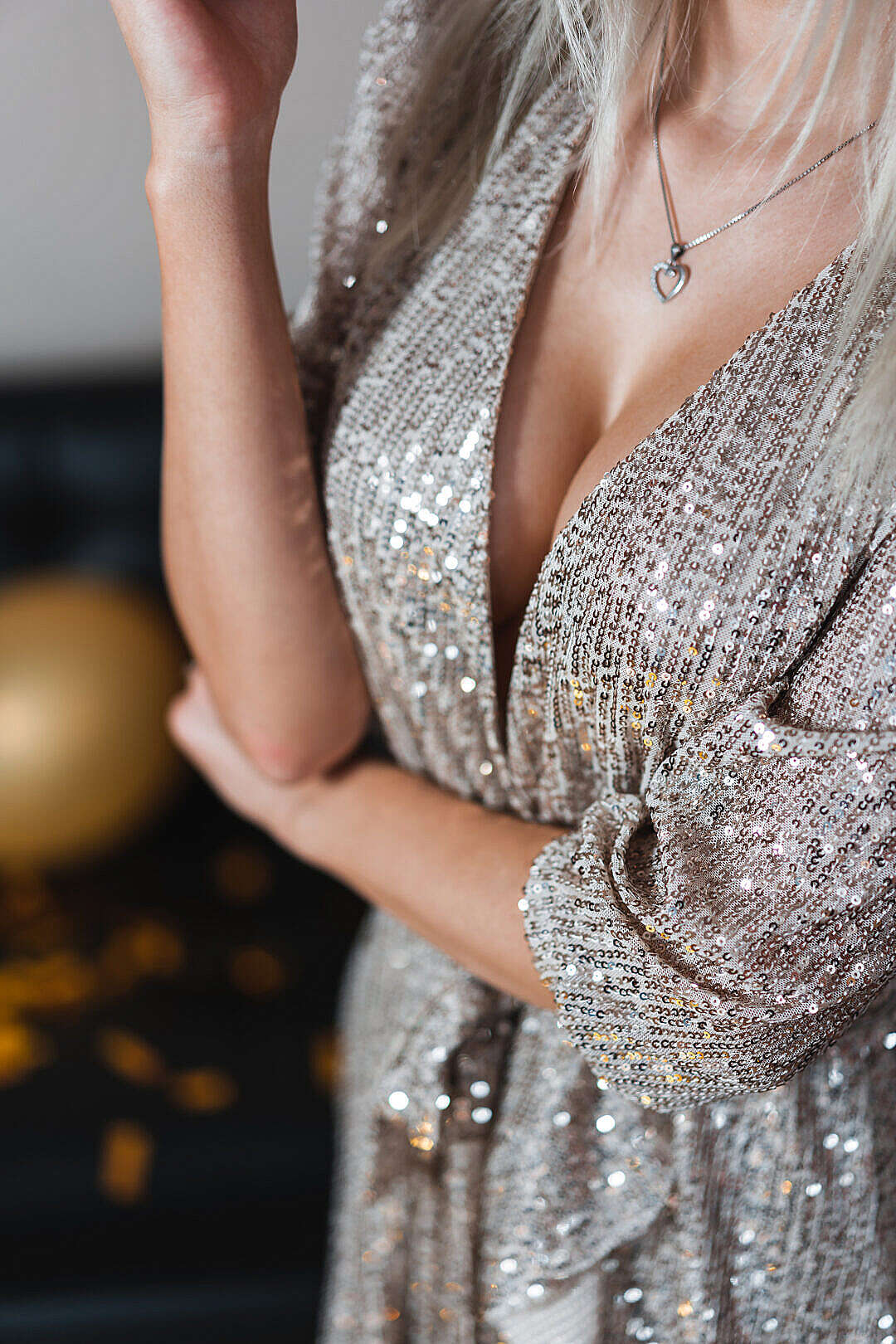 Woman in a Glittering Sequin Party Dress at the Celebration Party
