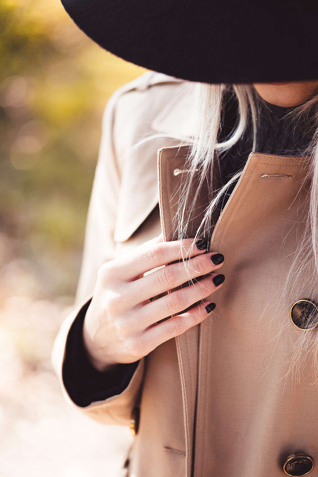 Woman in Trench Coat