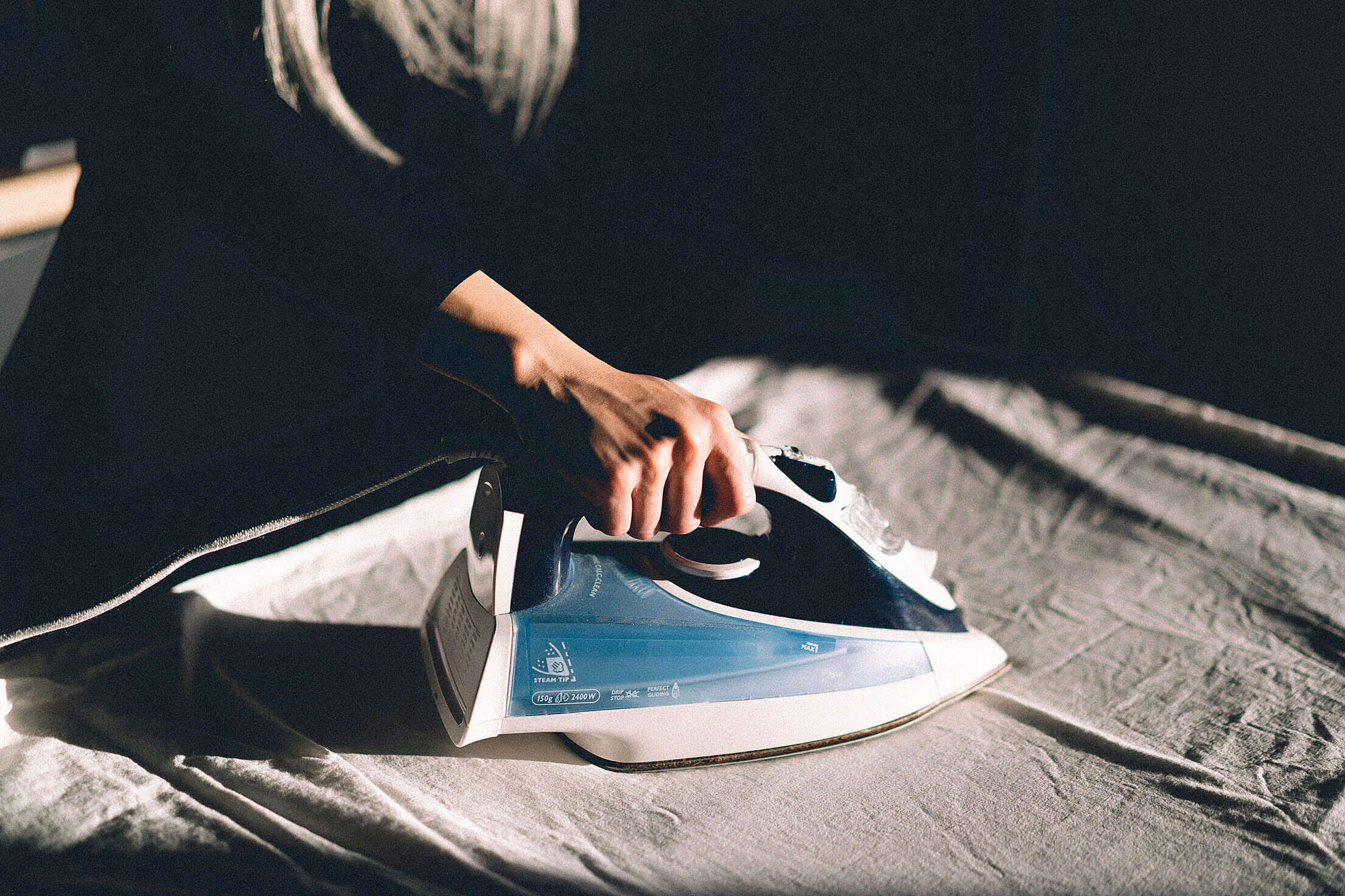 Woman Ironing Clothes Free Stock Photo
