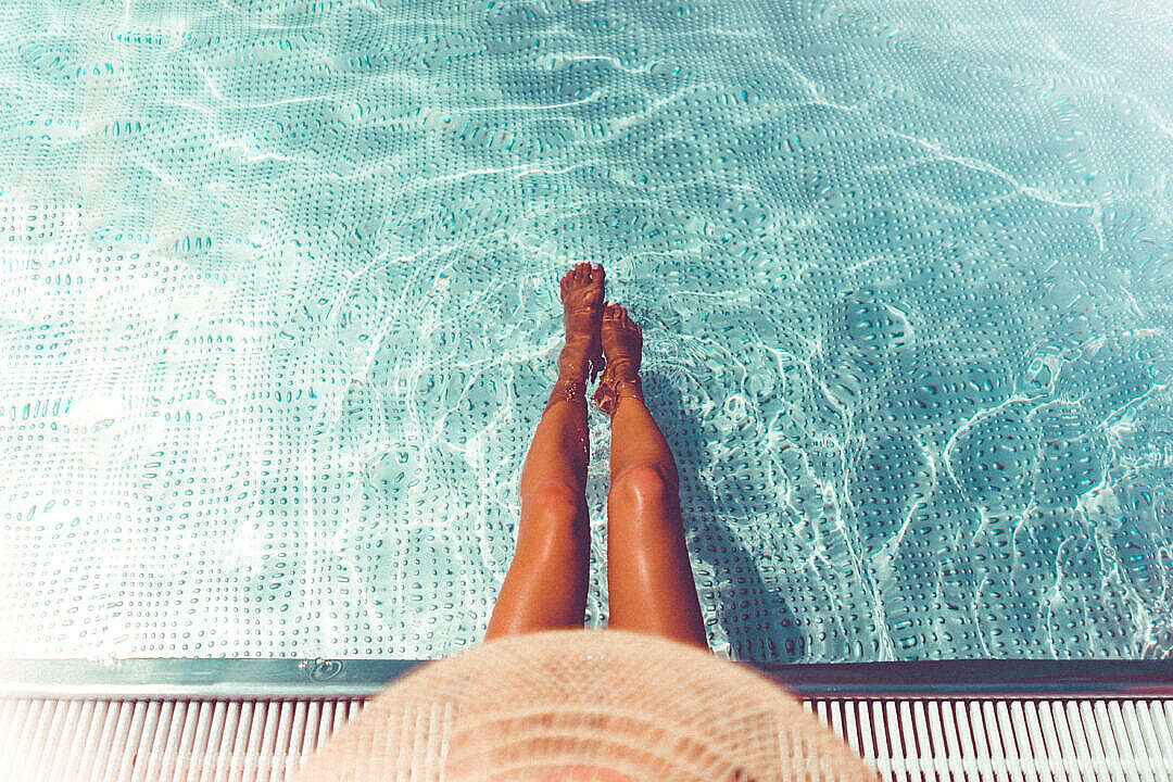Download Woman Legs in Swimming Pool FREE Stock Photo