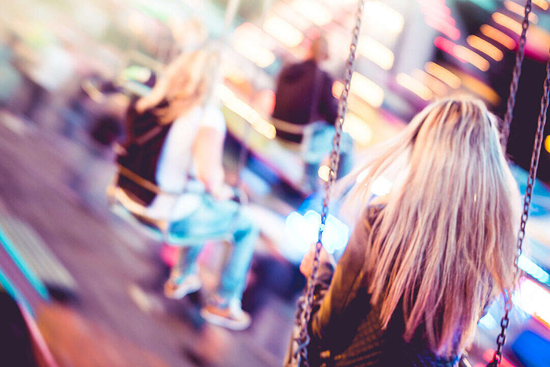 Woman on Carousel Swing Ride