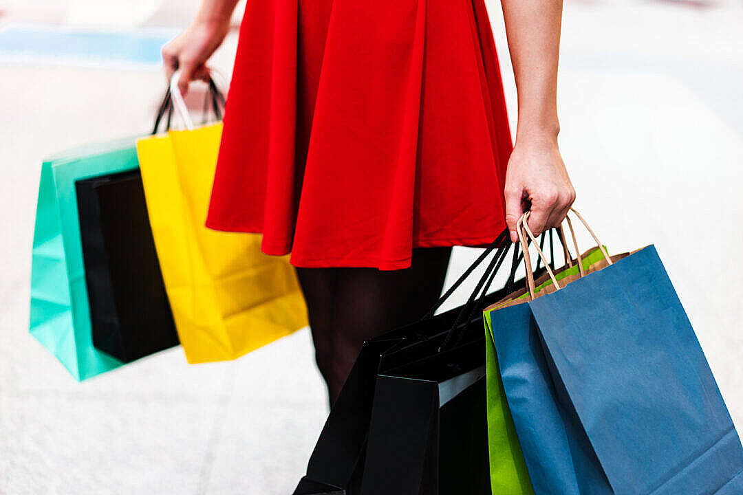 Woman With Black Friday Shopping Bags